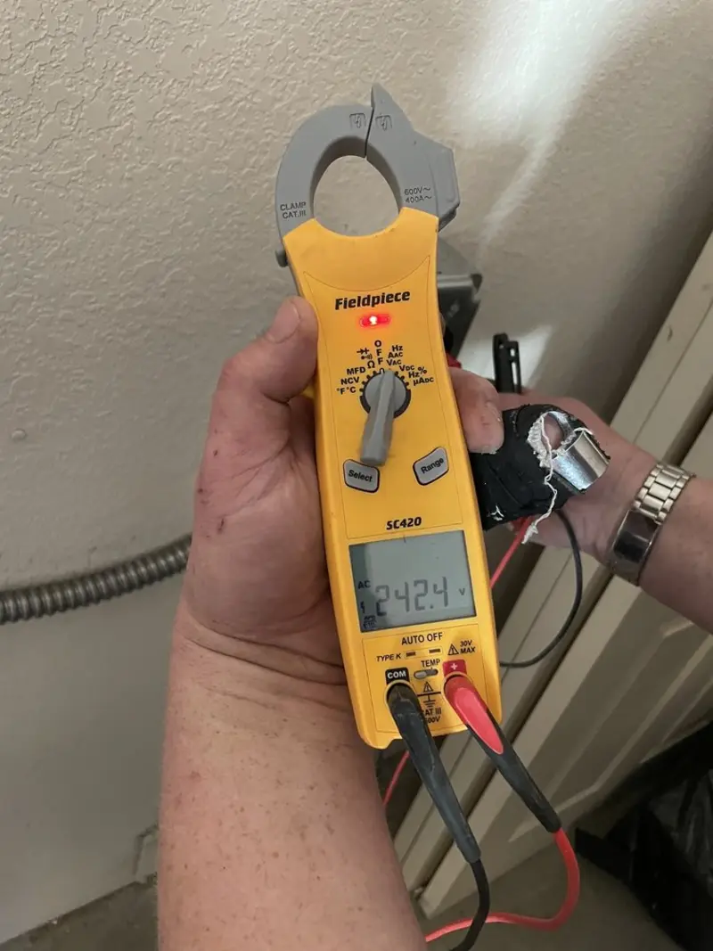Voltage testing with clamp meter during Generator Installation in Algonac
